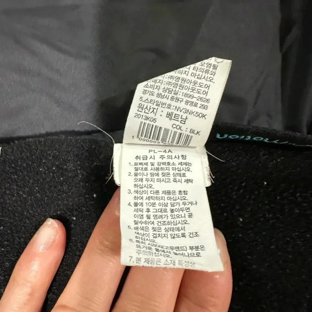The North Face black puffer vest full front zip, pockets, front and back logo